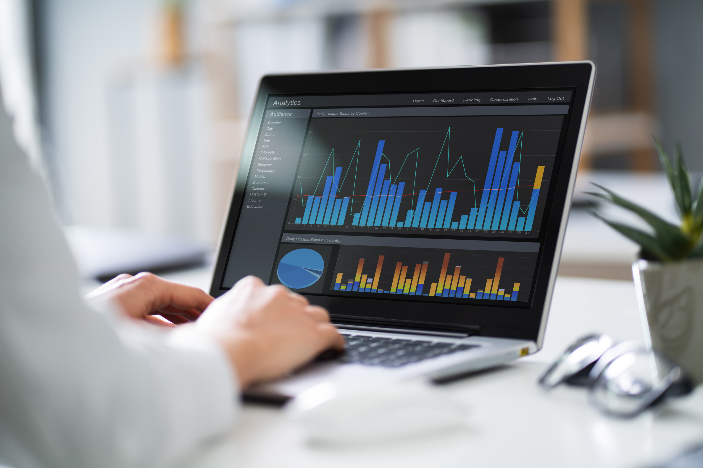 Businesswoman Analyzing Graph On Laptop